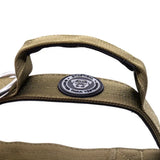Tan tactical dog harness with black gray circular logo patch shown with 4cm nylon btactical collar khaki green