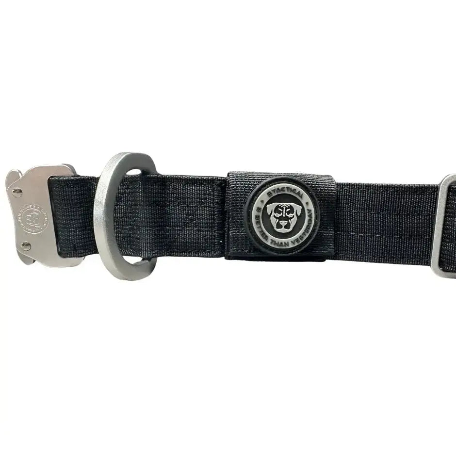 Black nylon btactical tracker collar with silver hardware and circular logo patch featuring stylized dog face