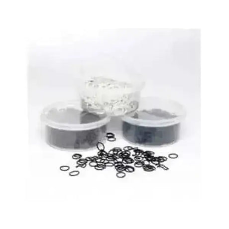 Black rubber plaiting bands scattered with three clear plastic containers of colored beads in a re-usable container with hinged lid