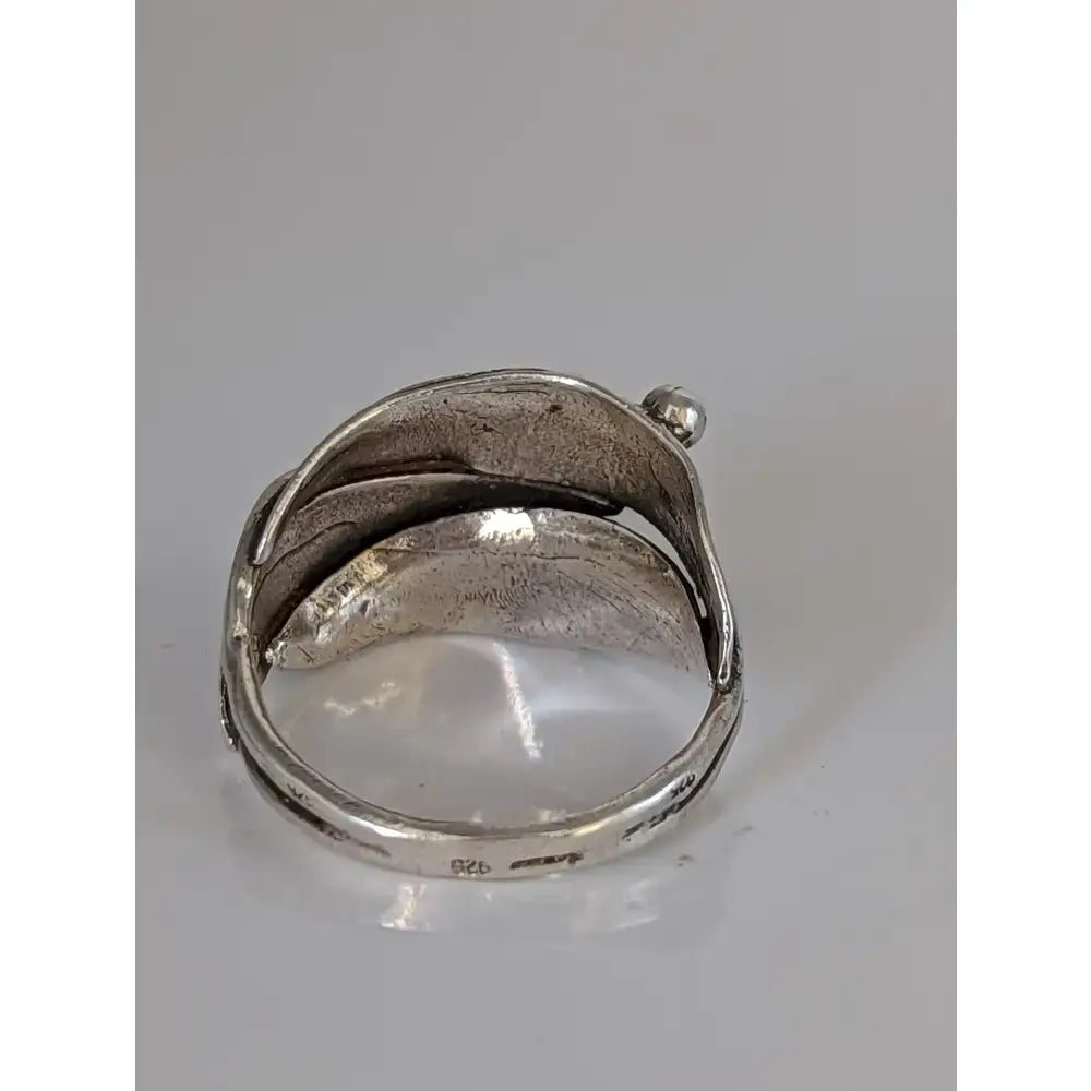 Silver leaves ring with silver buds in 925 silver featuring a textured leaf design and small spherical accent on top