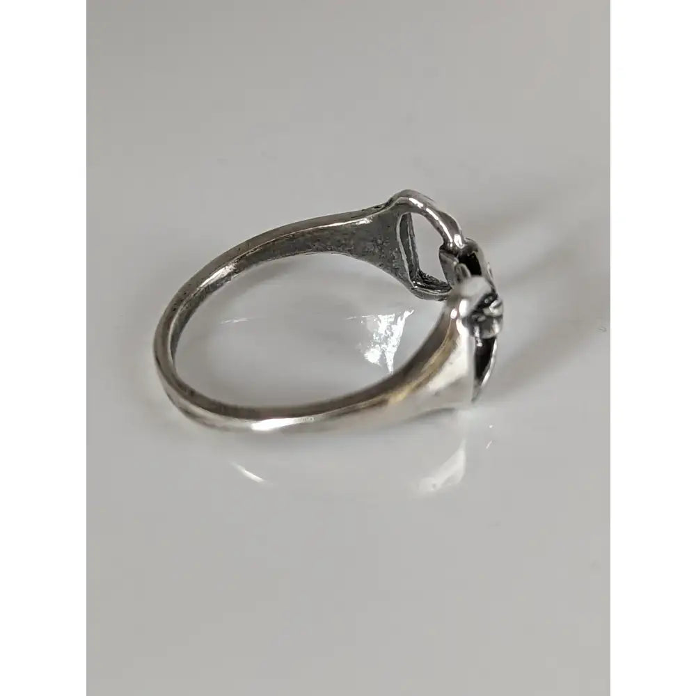 Silver snaffle bit ring in 925 silver featuring a delicate openwork design with a small faceted gemstone for equestrian jewellery