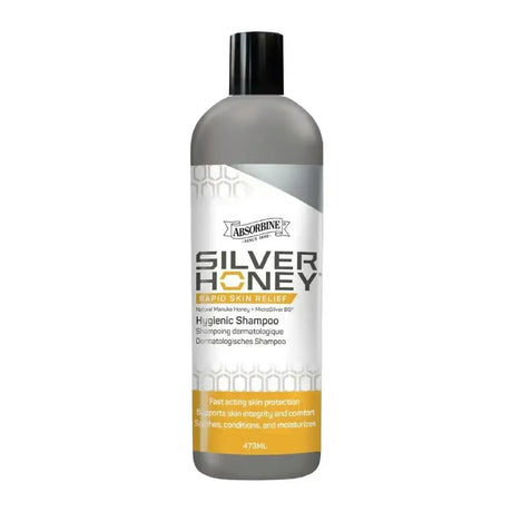 A sleek translucent gray bottle of absorbine silver honey hygienic shampoo with black cap and silver honeycomb label