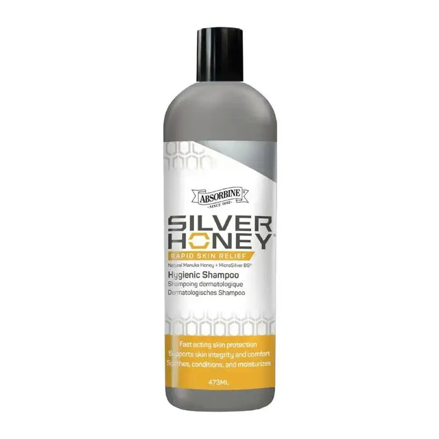 A sleek translucent gray bottle of absorbine silver honey hygienic shampoo with black cap and silver honeycomb label