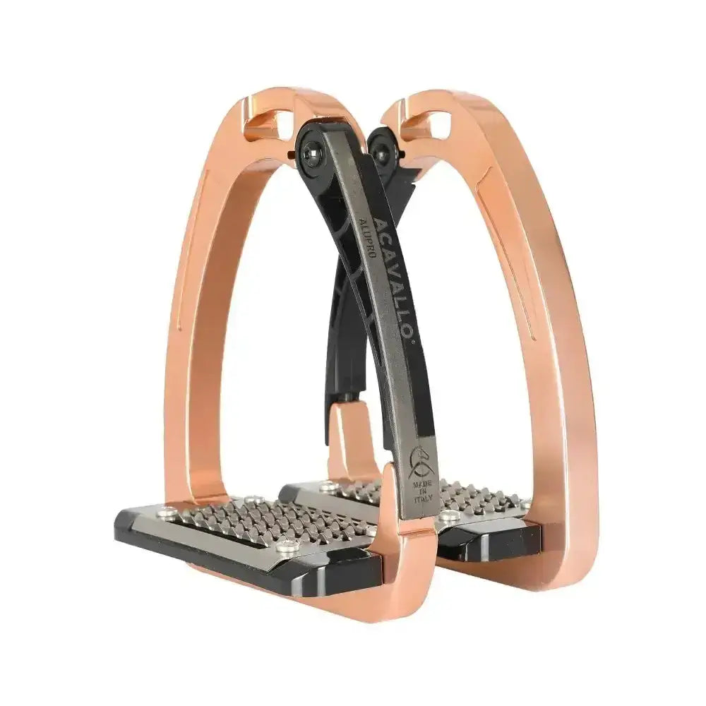 Rose gold and black metal acavallo arena alupro stirrup with textured non slip footplate and stress actuated locking