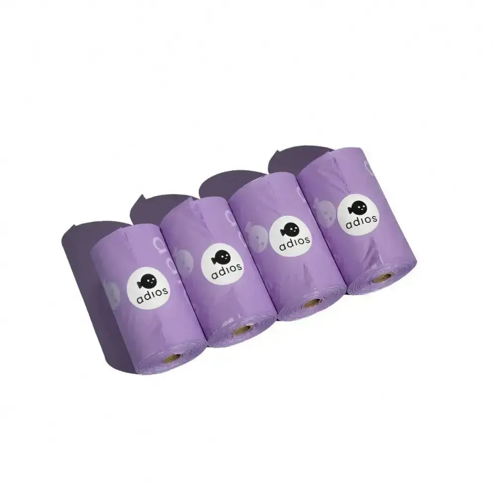 Purple adios non handle poo bags in 4 rolls with white circular labels featuring adios logo and fish icon