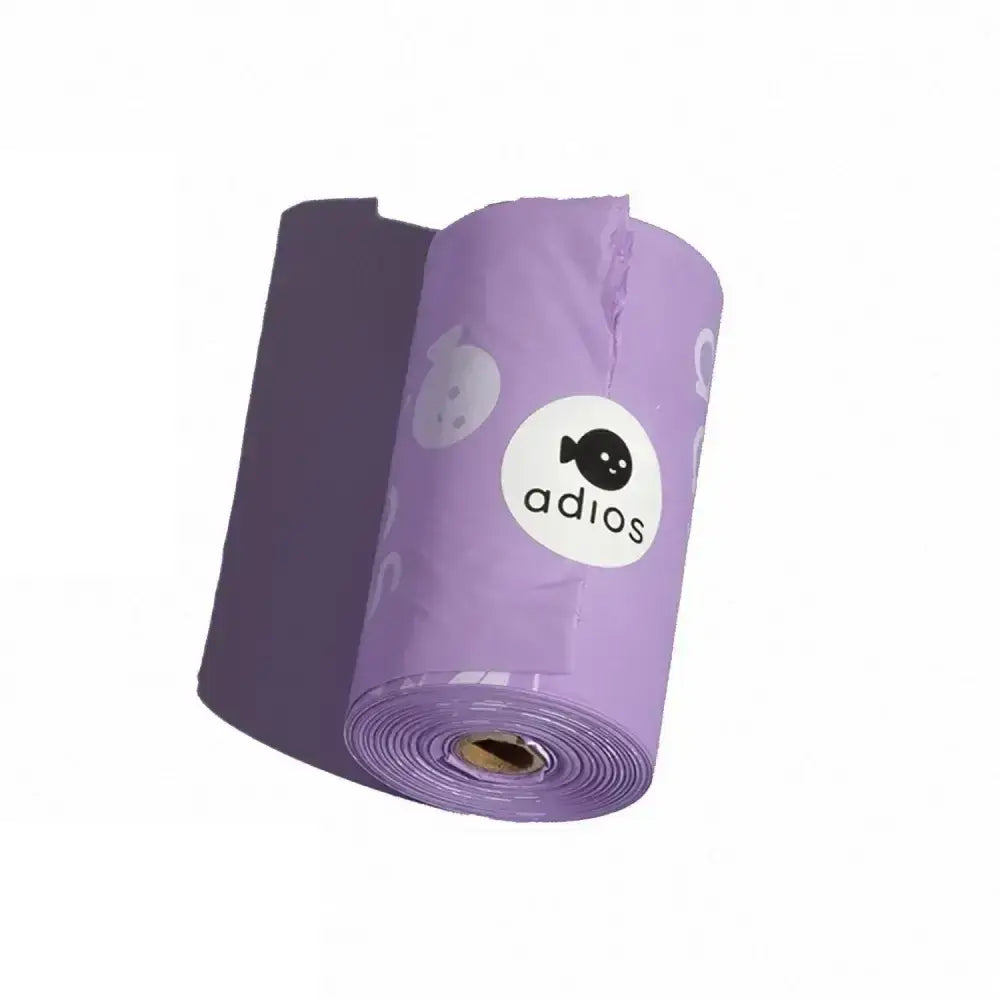 A roll of lavender non handle poo bags single roll featuring a white adios logo with a black fish icon
