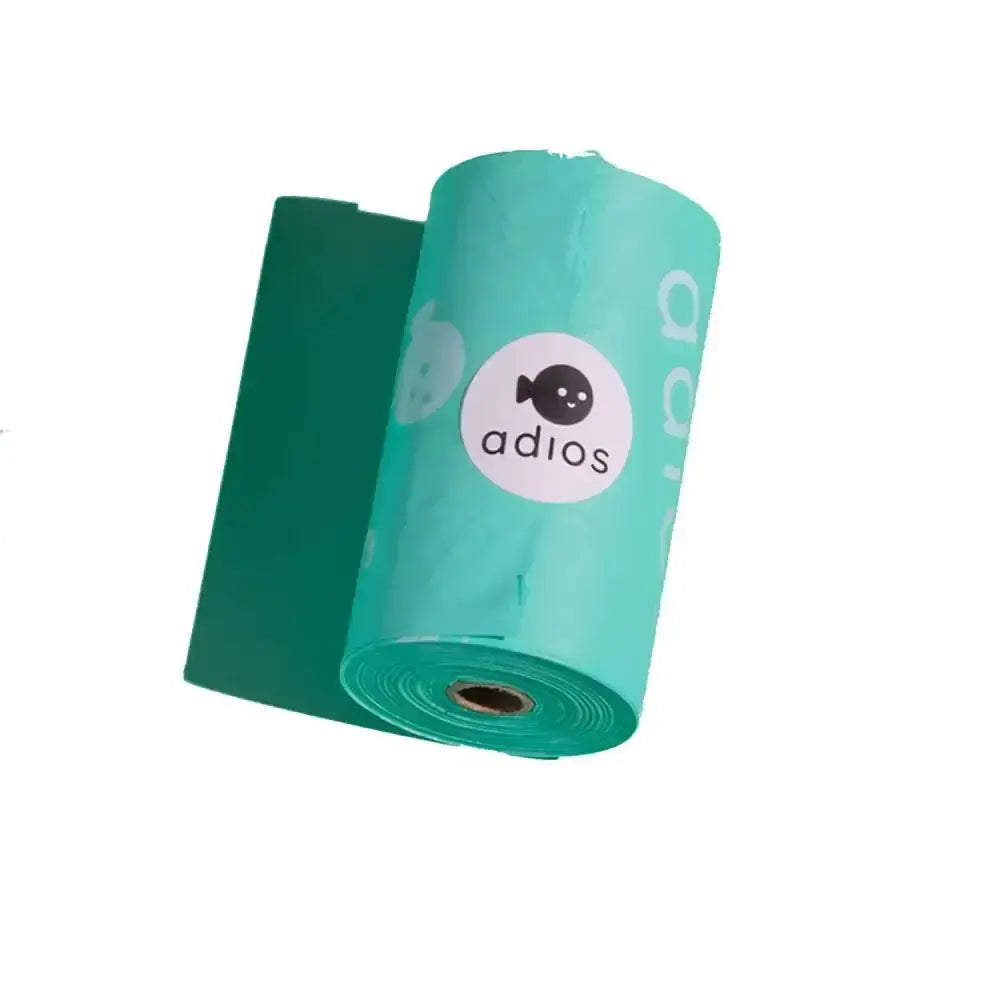 Teal-colored adios non handle poo bags single roll with cartoon fish design perfect for easy pet waste cleanup