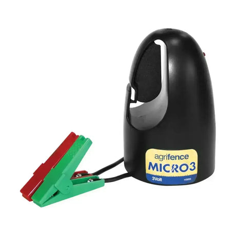 Black plastic agrifence micro 3 battery energiser with red green clips for portable short temporary fence use