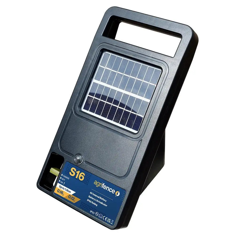 Black plastic agrifence s16 solar energiser with rectangular solar panel and blue label from barnstaple equestrian supplies