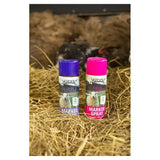 Two agrimark marker spray cans in purple and bright pink with sheep labels and a dispensing button for long lasting visible mark