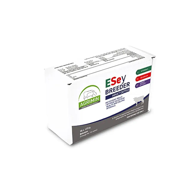White cardboard box of agrimin esey breeder adult cattle feed with green purple branding and cow silhouette showing sustained release anti-oxidant bolus