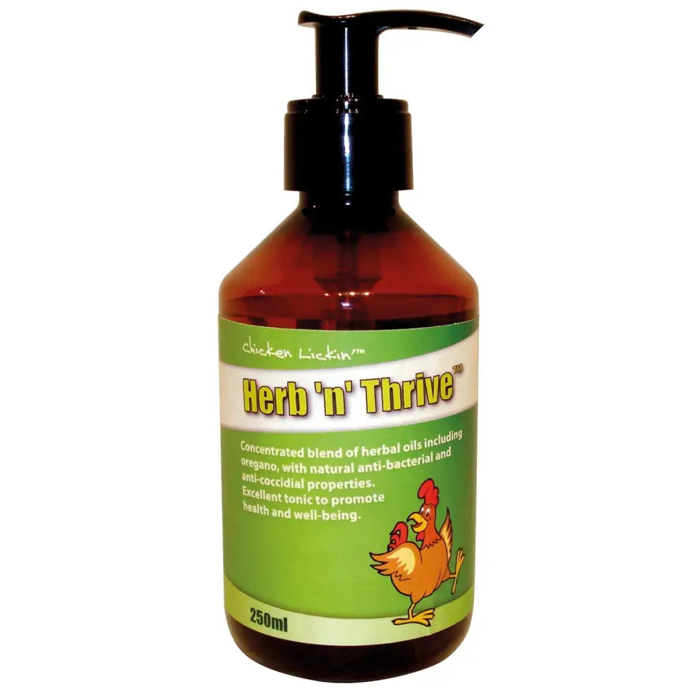 Amber glass bottle with black pump and green label featuring cartoon chickens labeled agrivite chicken lickin herb n thrive herbal oil blend