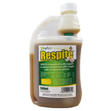 A 500ml translucent plastic bottle with white cap containing brown garlic-based liquid concentrate agrivite respite for respiratory ailments