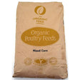 Brown paper bag of allen & page organic feed company mixed corn with gold lettering and organic certification logos