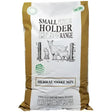 A brown and white bag of allen and page small holder goat herbal mix with black and white goat illustration