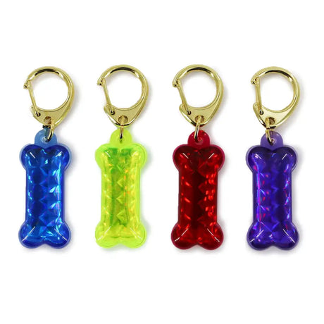 Four colorful translucent ancol dog reflective id tag bones x12 keychains with gold clasp in blue lime green red purple