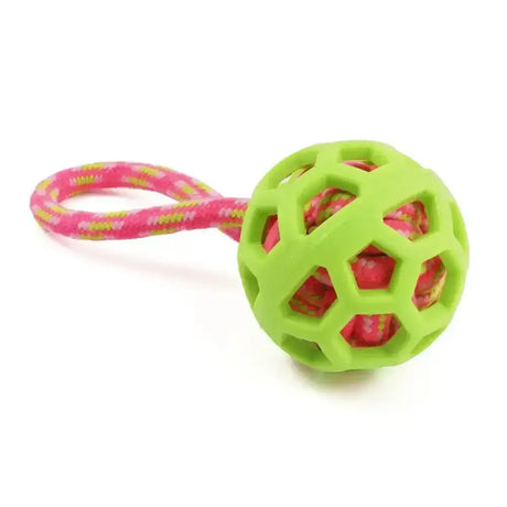 Bright green ancol jawables frame ball dog toy with hexagonal holes and pink yellow rope handle made from high density polymer
