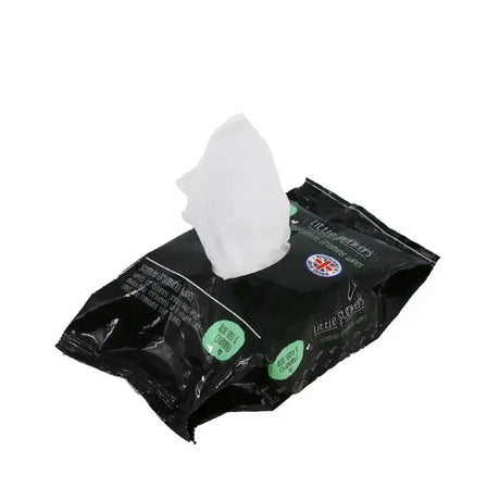 Black plastic pack of ancol little stinkers scented grooming wipes with a white pet wipe partially pulled out