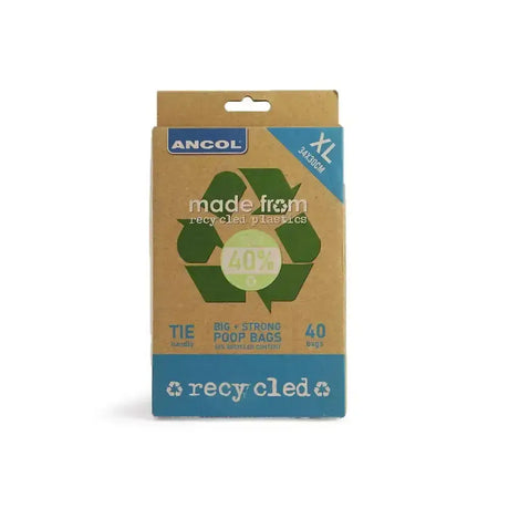 Ancol made flat pack poop bags in green and blue cardboard packaging made from ocean bound plastics