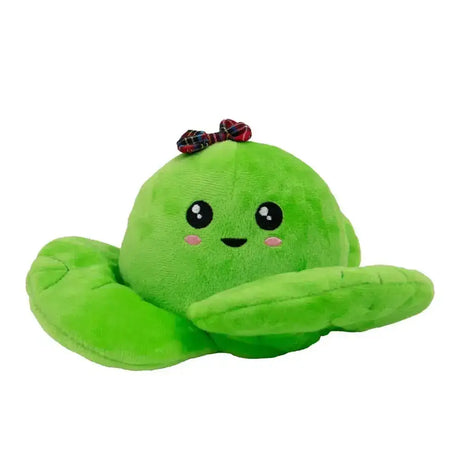A plush green cactus toy with a red black plaid bow pink cheeks and big eyes from ancol mrs sprout