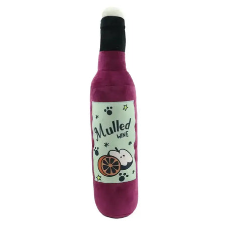 A plush magenta ancol mulled wine dog toy with black cork top and colorful christmas character label design