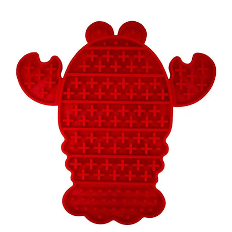 Red silicone orva lick lobster fidget toy with raised plus sign texture perfect as a lobster lick mat dog toy