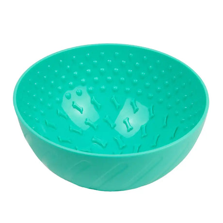 Teal silicone orva lick wobble bowl with bone-shaped textures and dotted interior for fun wobble bowl dog toys