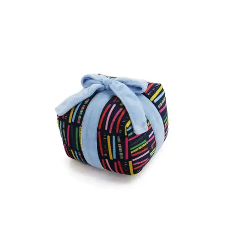 Ancol Pawty Time present dog toy cube wrapped in black fabric with rainbow stripes and tied with blue velvet ribbon