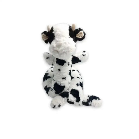 A plush black and white cow toy with soft fluffy fur from ancol playtime super long collection