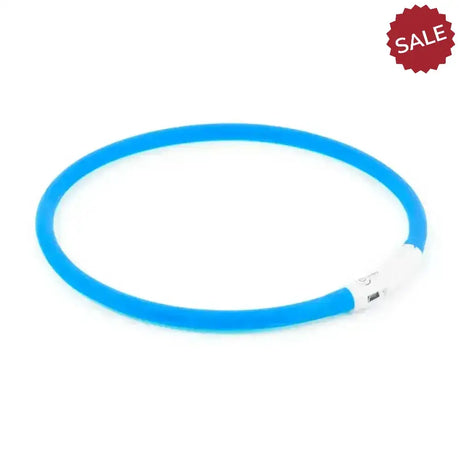 Bright blue silicone ancol rechargeable flashing dog collar with white usb port for instant dog visibility and neck illumination