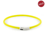 Bright yellow flexible led dog collar with white clasp and charging port for ancol rechargeable flashing and dog’s neck illumination