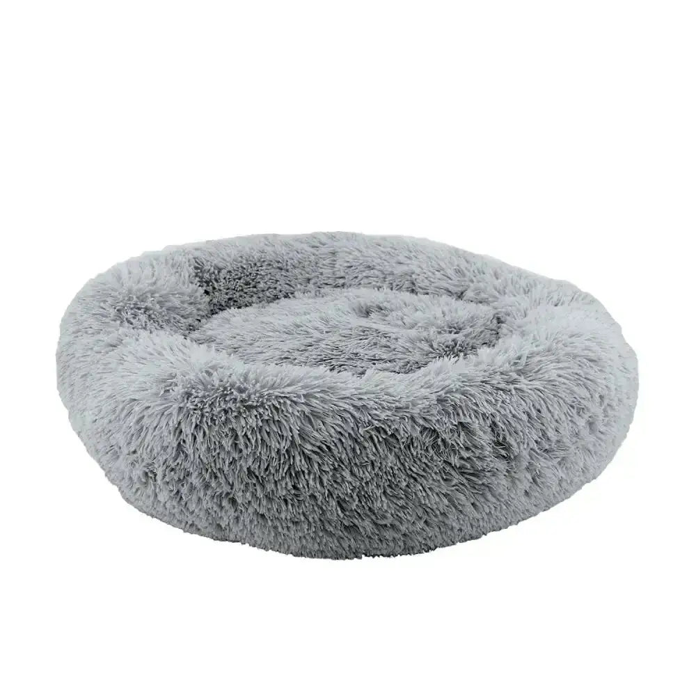 A plush gray ancol sleepy paws super plush donut bed with soft raised edges perfect for cozy pet napping