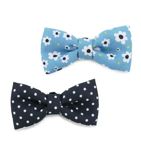 Light blue satin pet bow tie with white daisies black centers and green leaves from ancol soho pet daisy polka dot collection