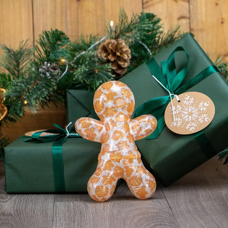 Transparent orange and white patterned squeaky gingerbread man ornament from ancol squeaky gingerbread collection