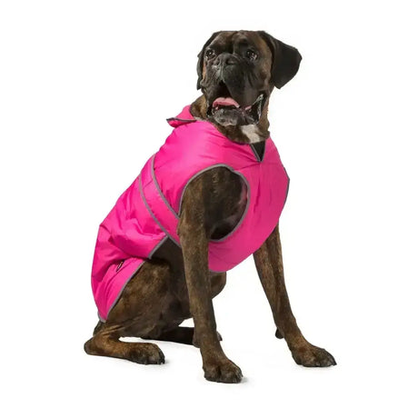 Bright pink ancol stormguard dog coat with gray reflective trim and splashguard chest protector design