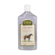 Clear plastic bottle of animal health company leg wash with white cap for washing horses legs and removing mud featuring a brown horse illustration