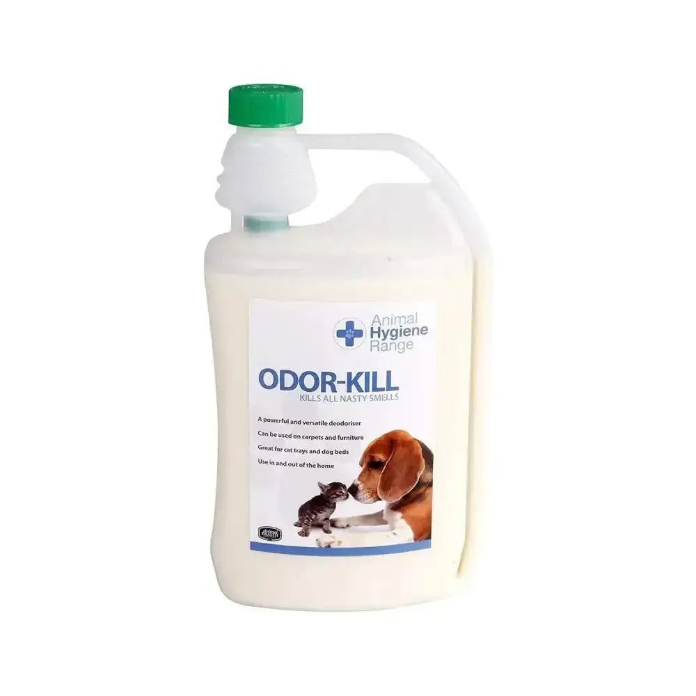 White plastic jug with green cap and handle labeled odor kill by animal health company powerful deodoriser for healthy environment