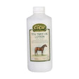 A white plastic bottle of animal health company ozoil tea tree lotion with a green beige label showing a horse illustration