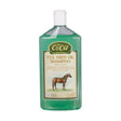 Green plastic bottle of animal health company ozoil tea tree oil shampoo with white cap and horse illustration label