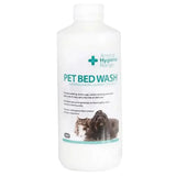 White plastic bottle of animal health company pet bed wash with teal black label showing cat dog for heavily soiled laundry