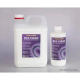 White plastic bottles of animal health company rug clean laundry detergent for washable rugs in large and small sizes