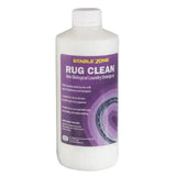 White plastic bottle of animal health company rug clean laundry detergent with purple label for washable rugs cleaning