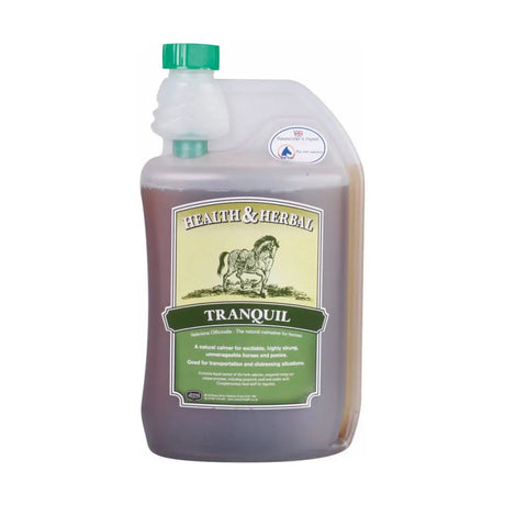 A translucent plastic bottle with a green cap labeled tranquil by animal health company contains a calmer based aqueous infusion