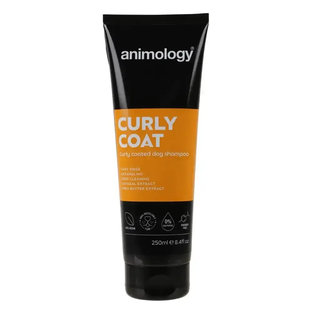 Black tube of animology curly coat shampoo with orange label and white text for curly coated dogs