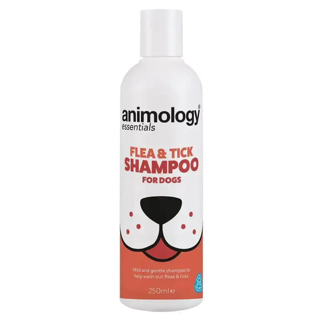 White plastic bottle of animology essentials flea and tick shampoo for dogs with cartoon dog face on orange label