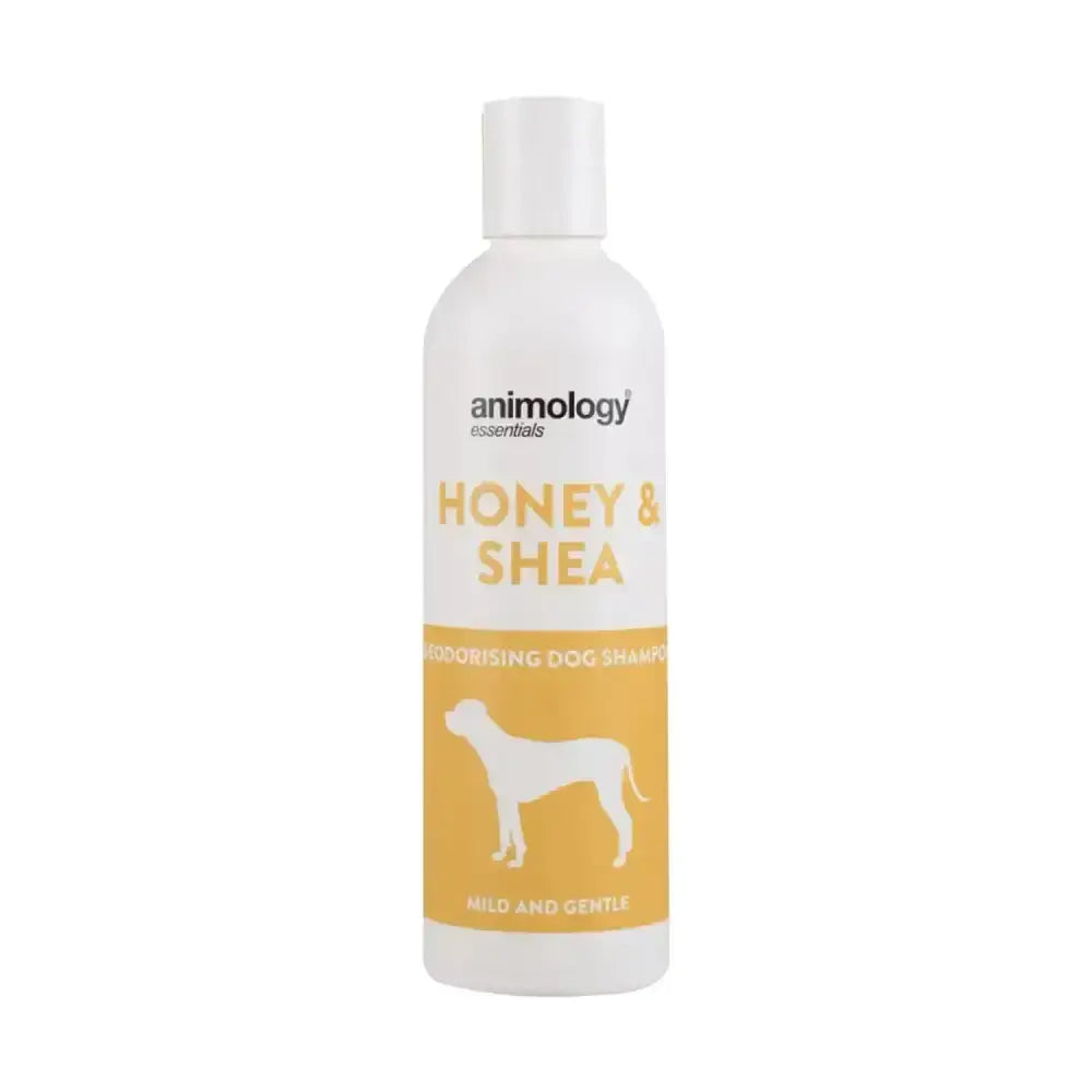A white bottle of animology essentials honey & shea deodorising & conditioning dog shampoo with yellow label and dog silhouette