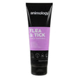 Black tube of animology flea and tick dog shampoo with purple label and white text specially formulated for puppies and dogs