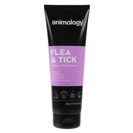 Black tube of animology flea and tick dog shampoo with purple label and white text specially formulated for puppies and dogs