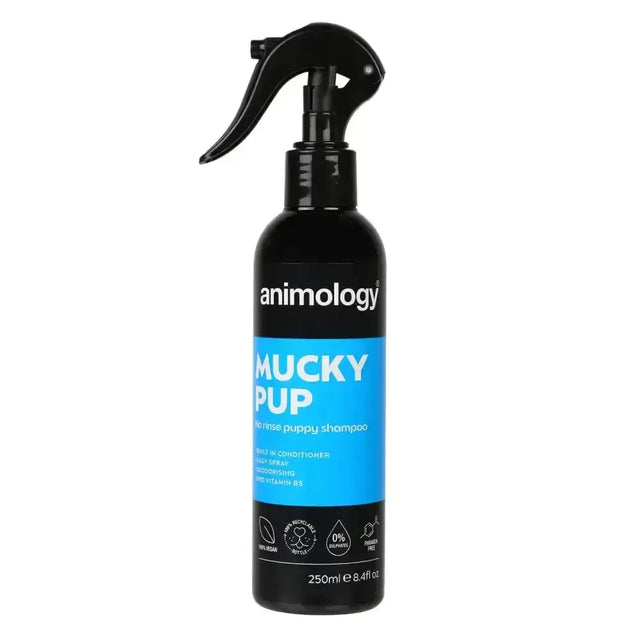 Black spray bottle of animology mucky pup no-rinse dog shampoo with a bright blue label and black trigger nozzle
