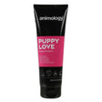 Black tube of animology puppy love puppy love shampoo with vibrant pink label and white text specially formulated for puppies